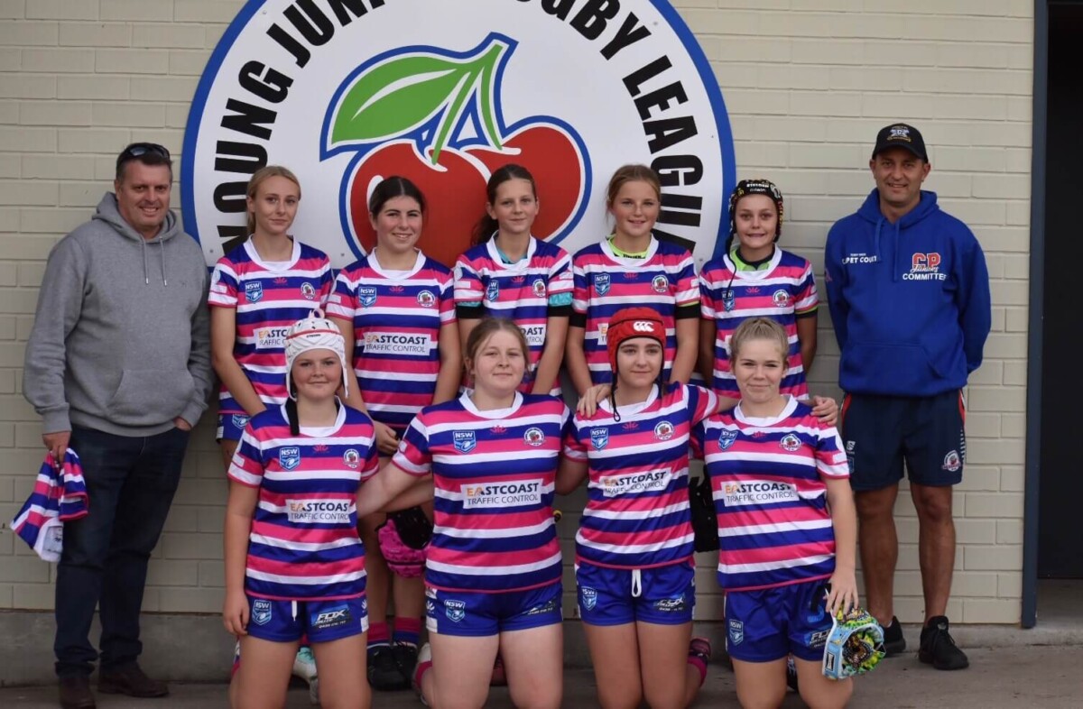 Young Junior Rugby League Cherrypickers Girls Under 14 team sponsored by East Coast Traffic Control