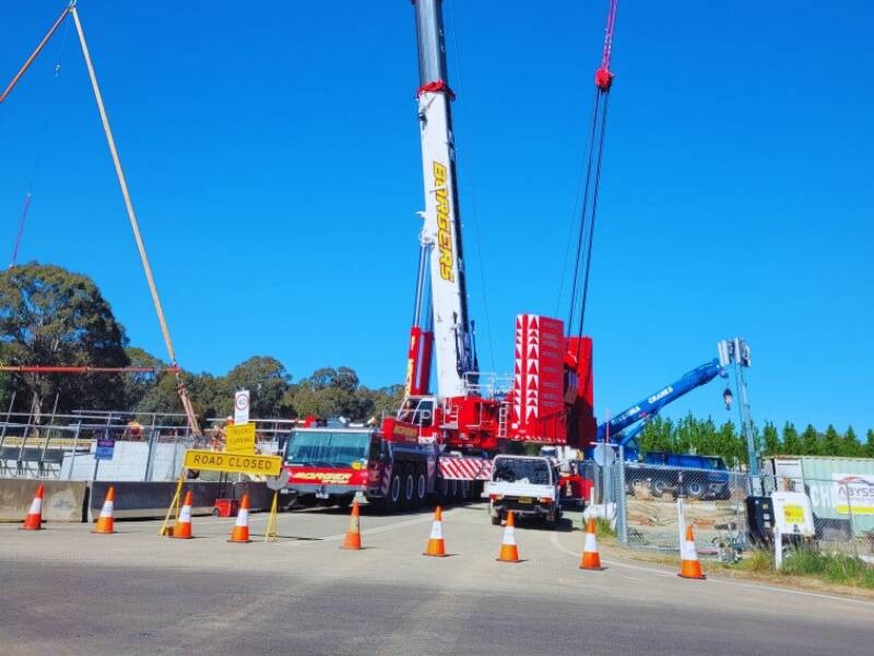 650-tonne crane lifting a Super-T girder at Wallendbeen Bridge construction site