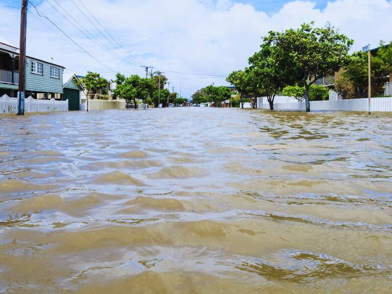 Traffic control barriers on a flooded road in North Queensland.