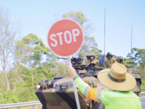 East Coast Traffic Control crew beginning early morning site setup with signage and cone placement